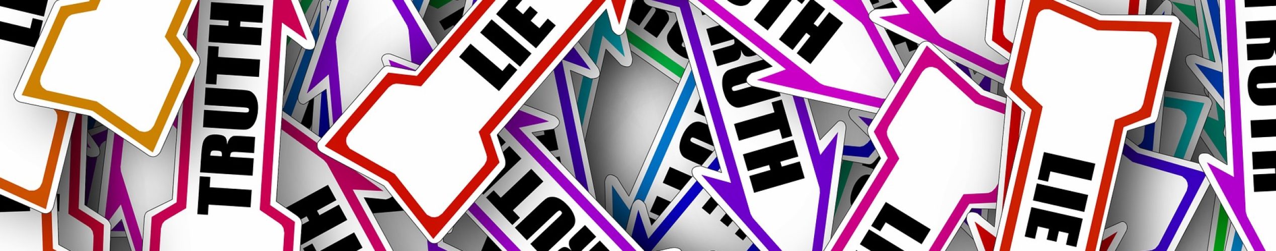 Pile of multicolored arrows labelled truth and lie representing greenwashing and ethical transparency